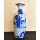 A KANG HSI BLUE AND WHITE VASE painted with figures. 14ins high.