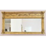 A GILTWOOD LONG OVERMANTLE MIRROR with urn and ribbon motifs. 5ft 4ins long x 2ft 9ins high.