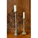 A GILT AND A SILVERED CANDLESTAND (2). 1ft 10ins and 2ft 6ins high.