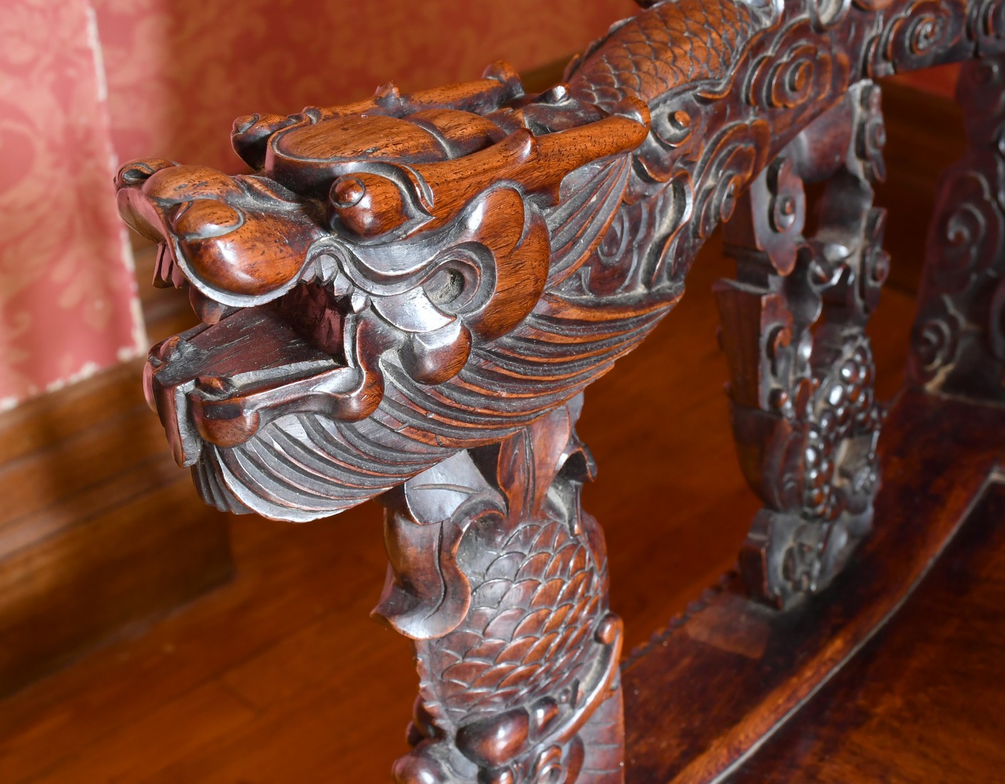 A GOOD PAIR OF CHINESE CARVED AND PIERCED ARMCHAIRS with solid seats, dragon arms and foliage. - Image 3 of 3