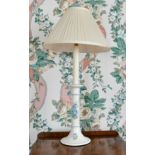 A PAIR OF PORCELAIN BEDSIDE LAMPS.