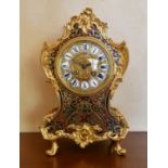 A MID 19TH CENTURY, FRENCH, BOULLE MANTLE CLOCK, the shaped body with all-over cut brass and