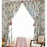 TWO PAIRS OF FLORAL FULL-LENGTH CURTAINS, PELMETS AND MIRRORS. 1ft 2ins diameter.