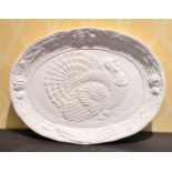 A LARGE WHITE OVAL TURKEY DISH.