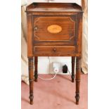 A MAHOGANY BEDSIDE CUPBOARD with drawer and panel door, on turned legs. 1ft 3ins diameter.