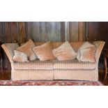 A LARGE PAIR OF KNOLL SETTEES. 7ft long.