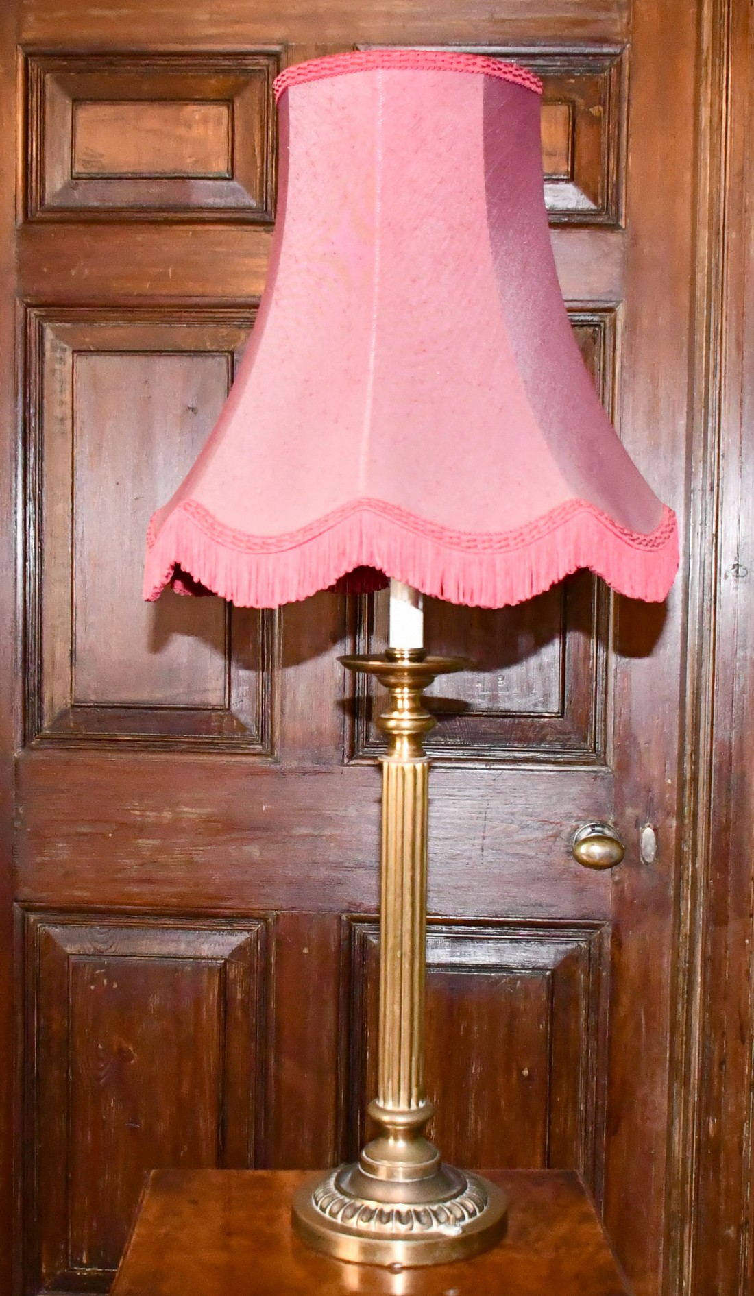 A GOOD BRASS LAMP AND SHADE.