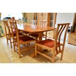 A MODERN DINING TABLE AND SIX CHAIRS, made of brown oak and sycamore, by Ron Jones Designer and