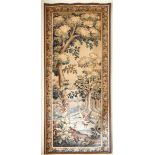 AN ANTIQUE BRUSSELS LONG TAPESTRY, a bird, trees and building. 8ft x 2ft 9ins wide.