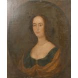 An 18th/19th century bust length portrait of a lady, oil on canvas, indistinctly inscribed verso and