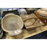 A large carved wood bowl and a pine trug style basket