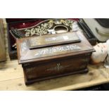 A good 19th century mother of pearl inlaid rosewood tea caddy