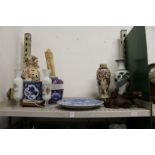 Chinese and other Eastern collectables to include vases, a cast wood oxon etc