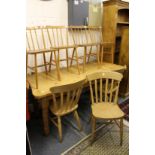 Three beech kitchen chairs and a set of four stick back kitchen chairs