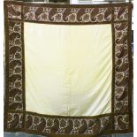 A GOOD EUROPEAN TURNOVER SILK SHAWL, the cream central panel within hand stitched paisley border, (