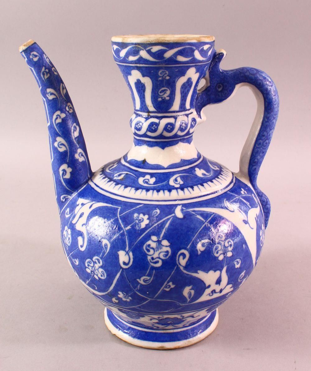 AN IZNIK STYLE CANTAGALLI BLUE & WHITE WATER URN, with motif decoration and a mark to the base,