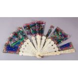 A 19TH CENTURY CHINESE CARVED IVORY AND PAINTED FOLDING FAN, the ivory sections with carved