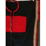 AN UNUSUAL ETHNIC JACKET, 20th Century, possibly Chinese minority people, red embroidered on a black