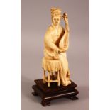 A 19TH / 20TH CENTURY CHINESE CARVED IVORY SEATED MUSICIANS, the female figure in a seated