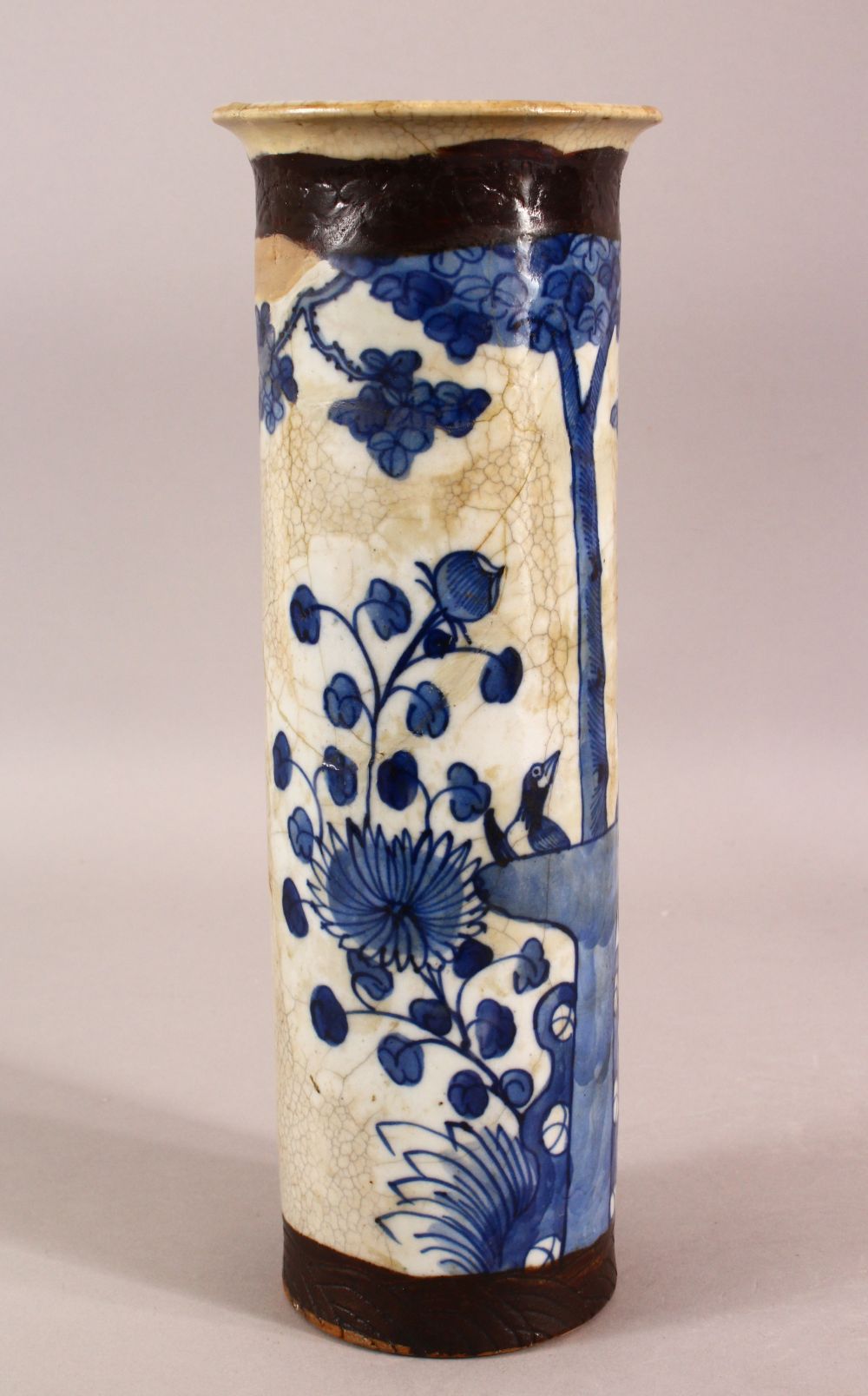 A 19TH CENTURY CHINESE BLUE & WHITE CRACKLE GLAZE SLEEVE VASE - decorated with birds, butterfly