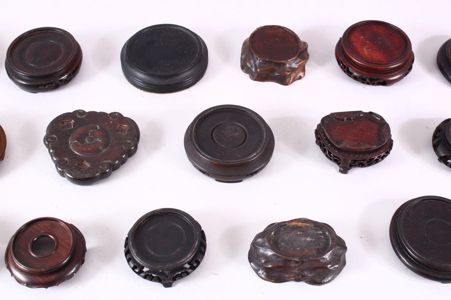 A MIXED LOT OF 20 CHINESE CARVED HARDWOOD STANDS - each of varying size, style and timber, the - Image 3 of 4