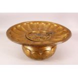 A LARGE 18TH/19TH CENTURY PERSIAN BRASS BASIN, with hinged lid, 37cm diameter.