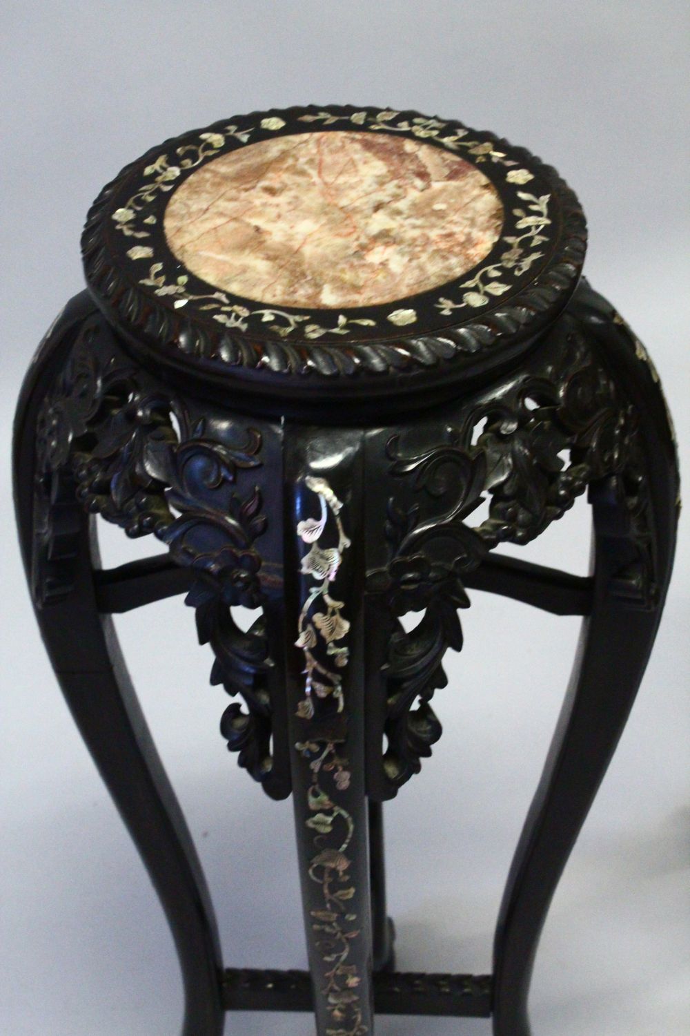 A GOOD PAIR OF LATE 19TH CENTURY CHINESE CARVED HARDWOOD TALL STANDS, each inset with a circular - Image 4 of 9