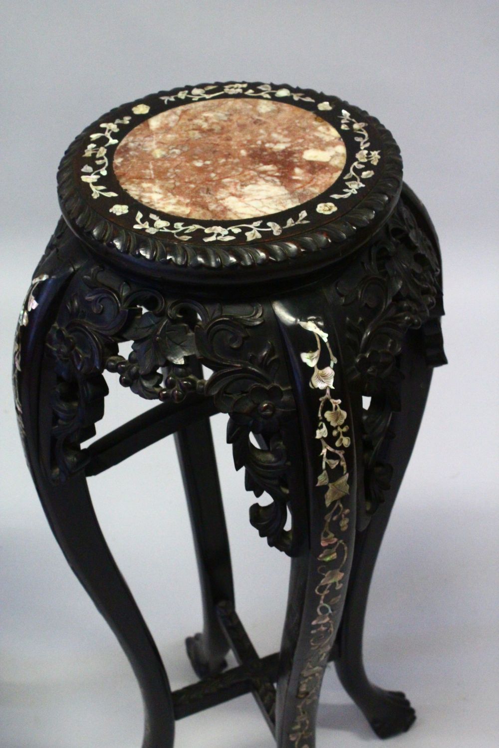 A GOOD PAIR OF LATE 19TH CENTURY CHINESE CARVED HARDWOOD TALL STANDS, each inset with a circular - Image 7 of 9