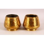 A PAIR OF 19TH CENTURY PERSIAN QAJAR ENGRAVED BRASS BOWLS, 11cm diameter.