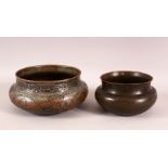 TWO 17TH CENTURY PERSIAN SAFAVID TINNED COPPER BOWLS, 21cm diameter and 15cm diameter.