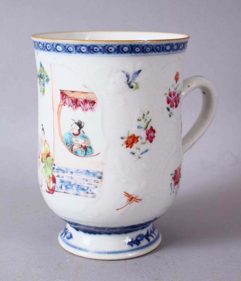 A 18TH / 19TH CENTURY QIANLONG FAMILLE ROSE PORCELAIN CUP, the body slightly moulded with panels