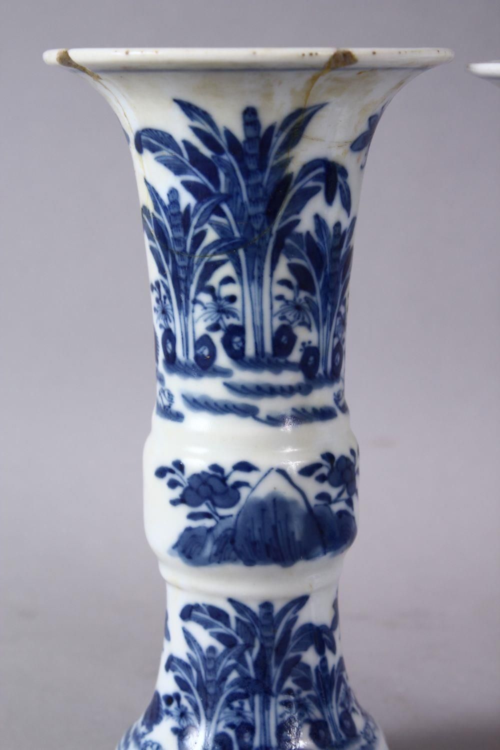 A PAIR OF 19TH CENTURY OR LATER CHINESE BLUE & WHITE PORCELAIN GU VASES, The body of the vases - Image 2 of 6