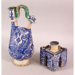 A 19TH CENTURY NORTH AFRICAN MOROCCAN POTTERY EWER, together with a similarly decorated inkwell,