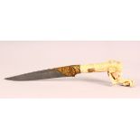 A GOOD INDIAN CARVED BONE & INLAID WATERED STEEL DAGGER, the hilt formed as an elephant from