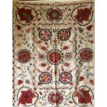 AN EMBROIDERED COTTON WALL HANGING / BEDSPREAD, 20th Century, Susani, 4ft 3ins x 3ft 4ins.