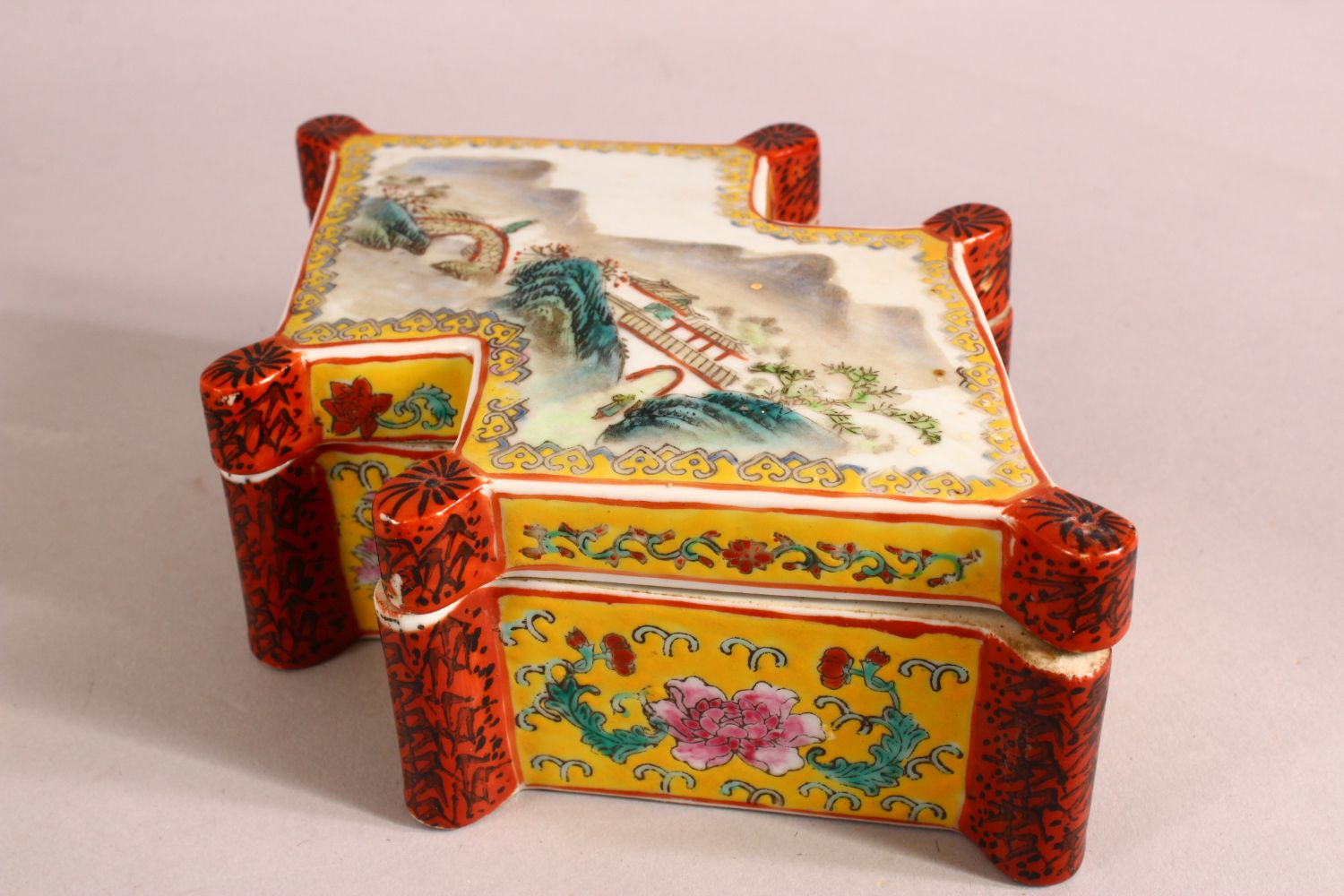 A CHINESE FAMILLE ROSE PORCELAIN BOX & COVER - the li decorated with a landscape view with a red - Image 2 of 7