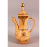 A TURKISH TOPHANE POTTERY COFFEE POT - with carved motif decoration highlighted in gilt - 30cm high