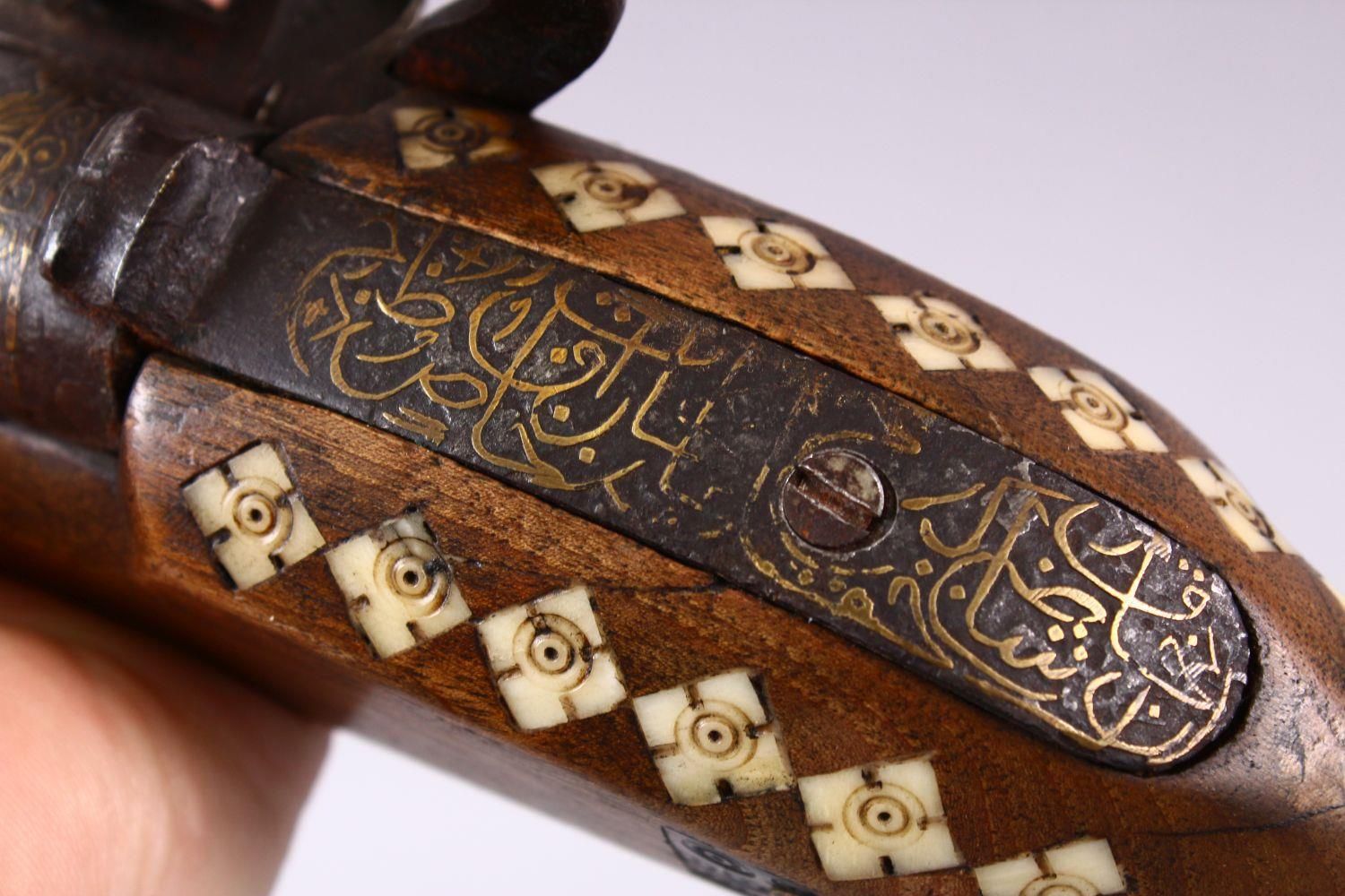 A 19TH CENTURY PERSIAN QAJAR FLINTLOCK PISTOL, with a very fine signed gold inlaid steel barrel, - Image 8 of 9
