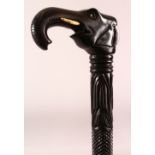 A GOOD CEYLONESE CARVED EBONY ELEPHANT HANDLE WALKING STICK - carved handle in the form of an