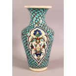 A TURKISH MARKET GLAZED POTTERY VASE, the body painted with fish scale decoration and floral motifs,