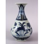 A CHINESE BLUE & WHITE MING STYLE PORCELAIN FLARED VASE, decorated with ducks amongst lotus, base