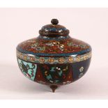 A CLOISONNE KORO AND COVER, decorated with butterflies, flowers and buddhistic emblems, on three