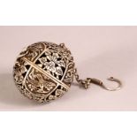 A CHINESE SILVER OPENWORK INCENSE BURNER BALL - Opening to reveal a holder for incense, carved