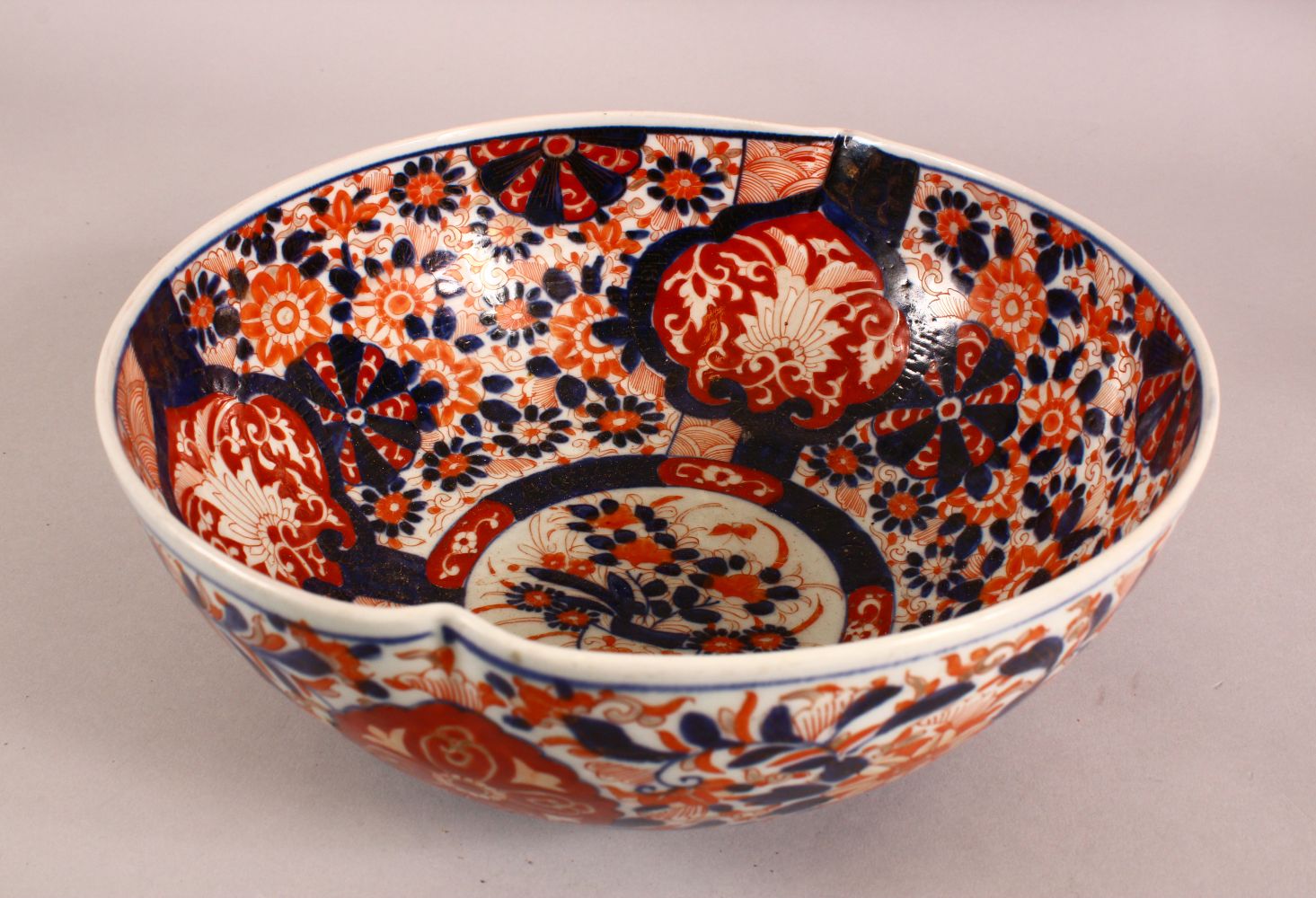 A JAPANESE MEIJI PERIOD IMARI PORCELAIN BOWL - decorated with typical imari palate -28cm diameter