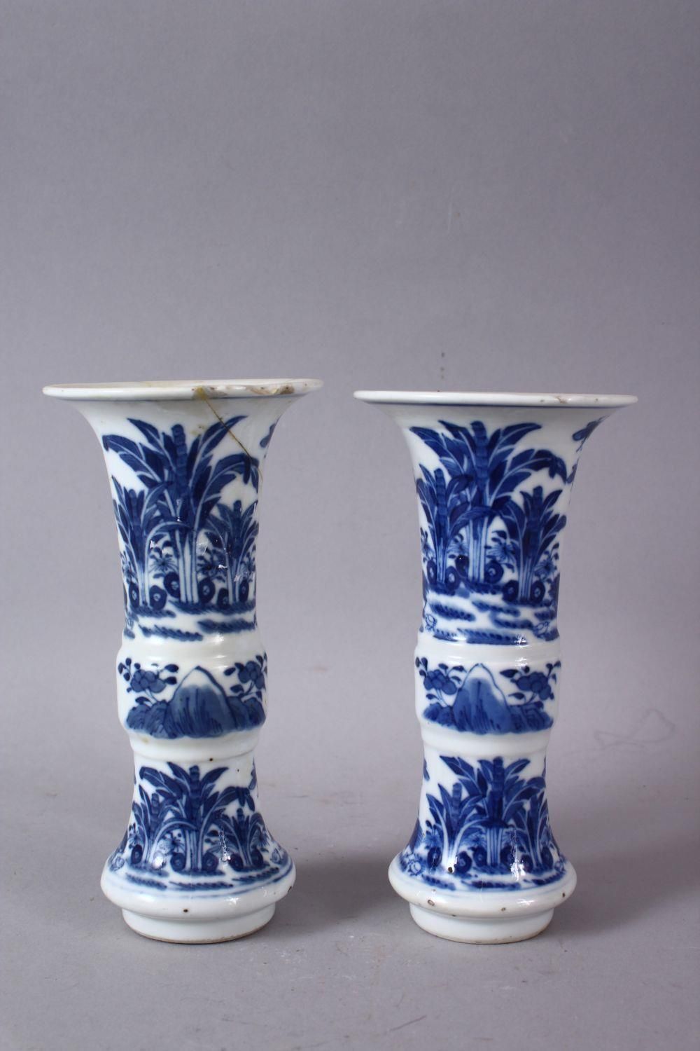A PAIR OF 19TH CENTURY OR LATER CHINESE BLUE & WHITE PORCELAIN GU VASES, The body of the vases - Image 4 of 6