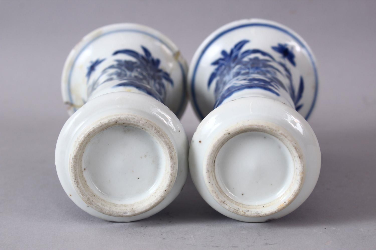 A PAIR OF 19TH CENTURY OR LATER CHINESE BLUE & WHITE PORCELAIN GU VASES, The body of the vases - Image 6 of 6