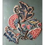 AN INTERESTING COLLECTION OF TEXTILE FRAGMENTS mostly European, to include crewelwork slips, circa