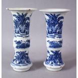 A PAIR OF 19TH CENTURY OR LATER CHINESE BLUE & WHITE PORCELAIN GU VASES, The body of the vases