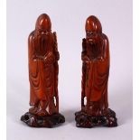 A PAIR OF 19TH CENTURY CHINESE CARVED BOXWOOD FIGURES OF SHOU LAO, the figures possibly boxwood,