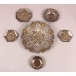 A COLLECTION OF SIX 19TH CENTURY INDIAN PUNJAB SIALKOT SILVER AND GOLD INLAID STEEL DISHES,